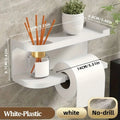 Wall-mounted tissue holder mounted without drilling holding a tissue box in a bathroom.