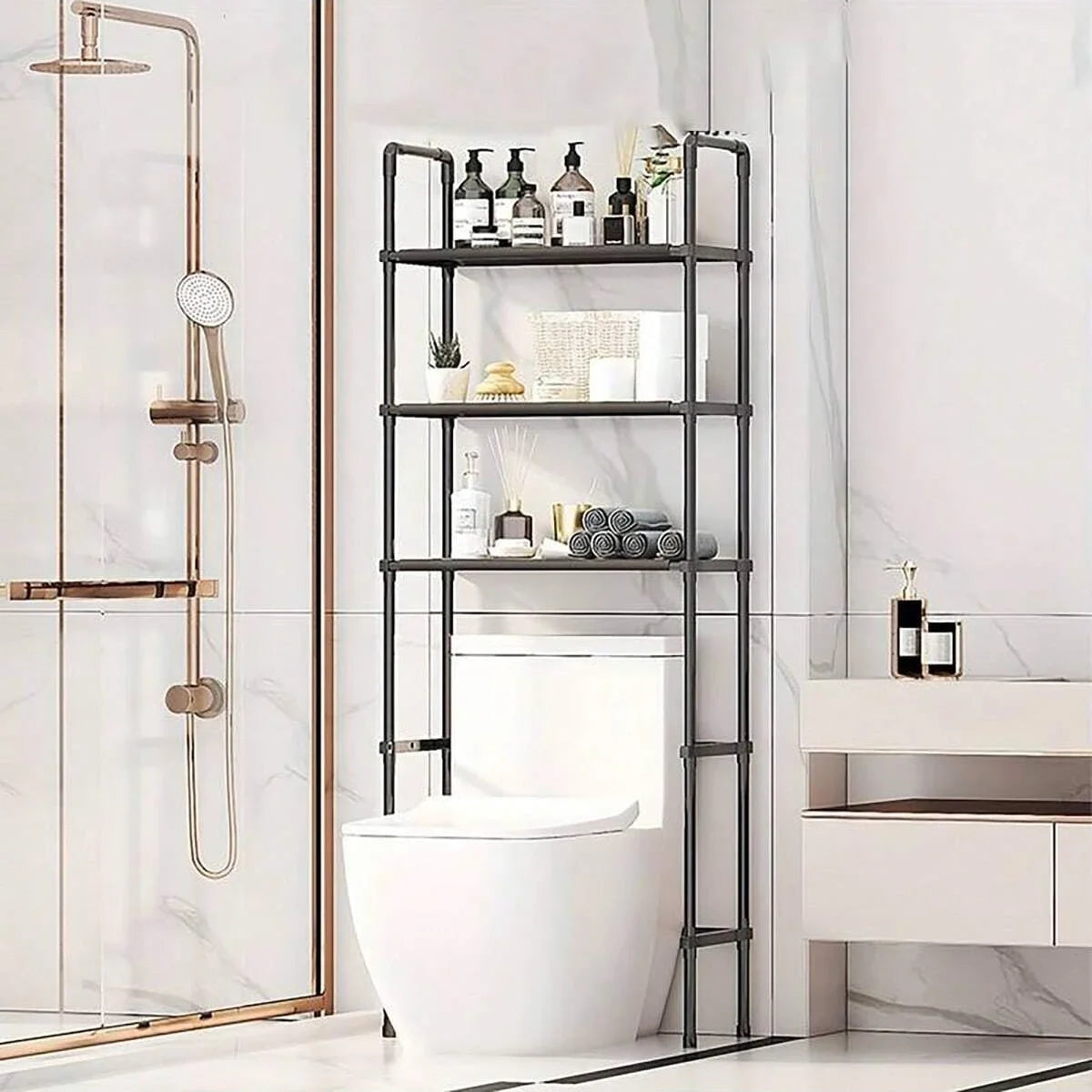 Over the toilet storage rack with shelves holding towels and toiletries in a bathroom.