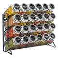Four tier carbon steel spice rack organizer holding labeled jars on a kitchen wall.
