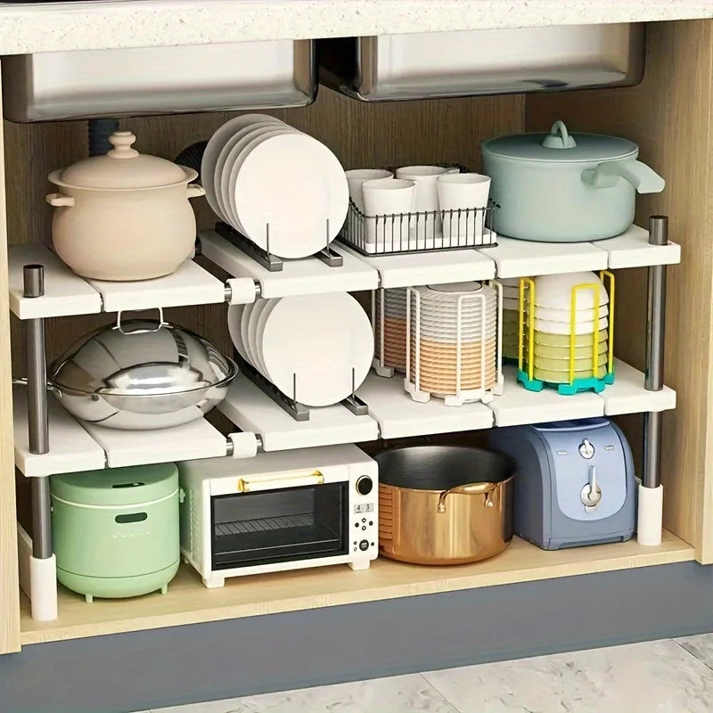 Under sink organizer shelf holding cookware and cleaning supplies in a cabinet