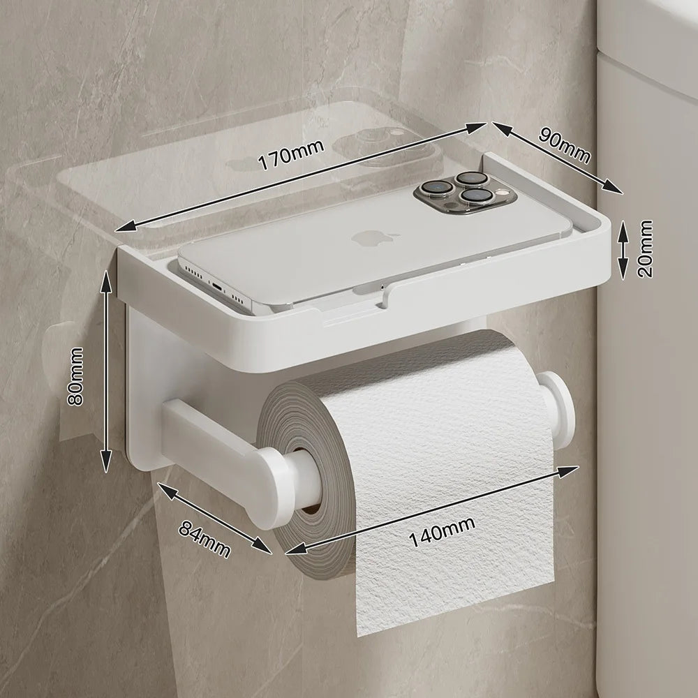 Wall mount toilet paper holder with a phone shelf tray in a bathroom.